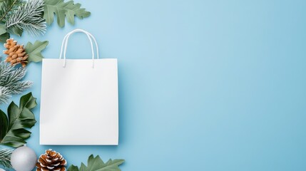 White Gift Bag with Festive Winter Decorations on Blue