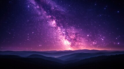 Fototapeta premium A vibrant purple and pink galaxy illuminates a dark mountain range silhouette.