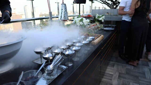 ice cream with liquid nitrogen on a festive table in a restaurant