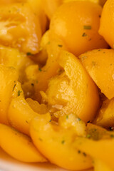 tomatoes with spices cut into pieces, clean washed tomatoes are cut into pieces for cooking salad