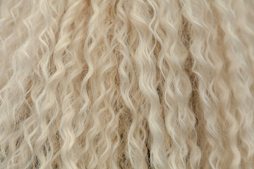 Blond beautiful wavy hair pattern. Top view.