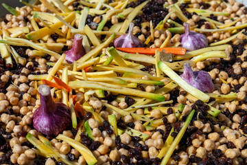 preparation for cooking asian pilaf. cooking vegetables and spices for pilaf