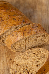a healthy loaf of soft bread with added seeds and bran