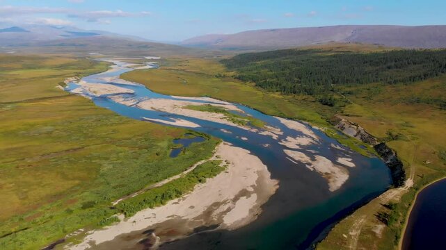 View of the Rai-Iz mountain and the Sob River in the Polar Urals on a sunny summer day, Yamal, Russia