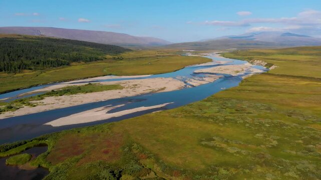 View of the Rai-Iz mountain and the Sob River in the Polar Urals on a sunny summer day, Yamal, Russia