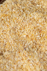 dried garlic for cooking closeup, dried spices from very small pieces of garlic fruits, dehydrated