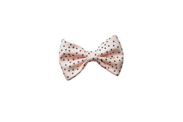 Elegant peach polka dot bow tie isolated on black background perfect for fashion design and branding on transparent background