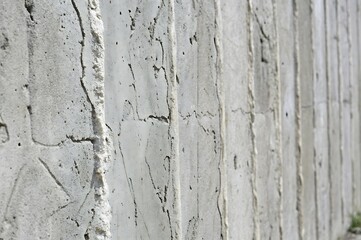 Obraz premium High-Resolution Close-Up of Abstract Concrete Wall Texture with Cracks and Rough Surface – Ideal for Industrial Design, Architecture Visualization, Graphic Backgrounds, and Digital Art Projects