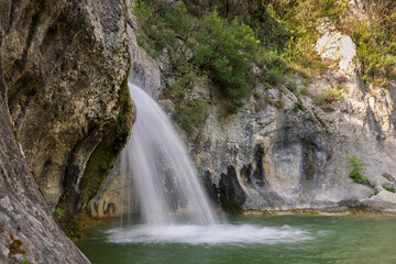 Fototapeta premium Gour de la Sompe waterfall after a few days of rain, Ardèche, France