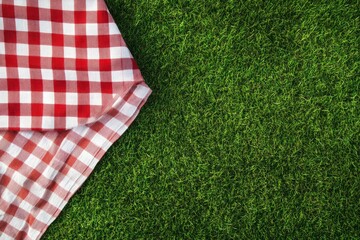 Red Checkered Cloth on Green Grass
