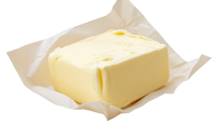 Fresh butter block wrapped in parchment paper on transparent background