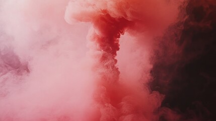 Obraz premium Vibrant pink and red smoke swirling in a dramatic cloud formation.