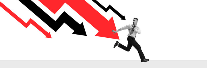 Banner. Conceptual art collage. Businessman runs from giant red arrow in panic representing fear of...