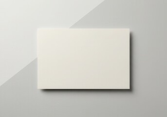 Fototapeta premium Greeting card and envelope mockup top view on gray background for invitation or stationery branding