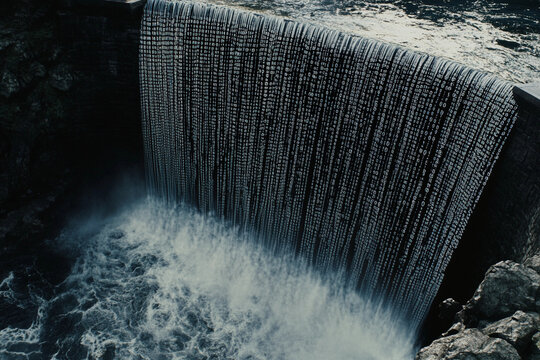 Futuristic waterfall cascading with binary code in a digital landscape illustrating advanced technology - Powered by Adobe
