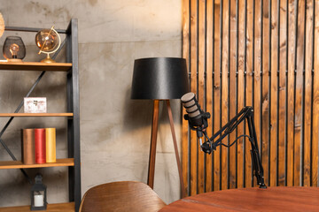 Discussion space with a microphone set for a podcast interview in a stylish interior