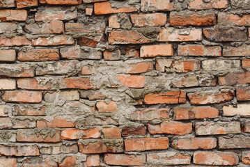 old brick wall, red and white colour, broken bricks, peeling plaster, vintage texture, background for banner, copy space