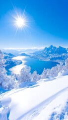 Sunlit snowy vista overlooking a serene, azure lake nestled between snow-capped mountains