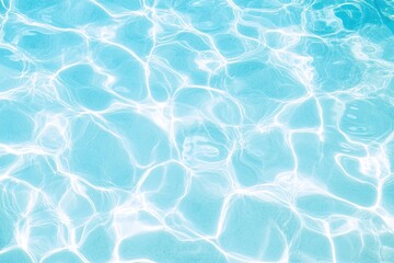 Refreshing clear blue pool water with sunlight reflections