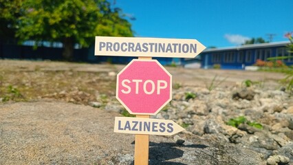 Procrastination and laziness sign board