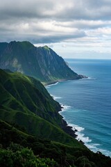 Fototapeta premium mountains and ocean with a few clouds in the sky