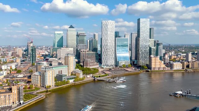 Aerial hyper lapse view of the financial district Canary Wharf in London