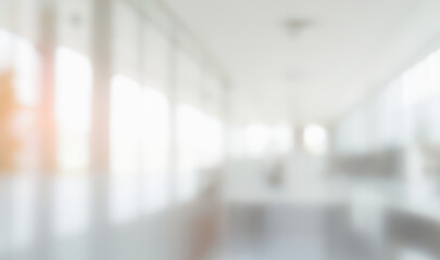 Blurred background of a bright interior space with windows and indistinct furniture. Ultra bokeh photos with a touch of soft and warm light.