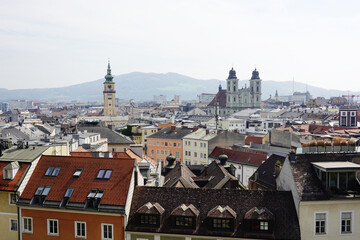 Fototapeta premium The view of Old Dom Cathedral and Maria Himmerfahrt Church from the Castle hill,. Linz, Austria 