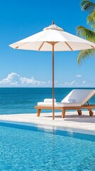 Tranquil poolside scene with chaise lounge, umbrella, and ocean view