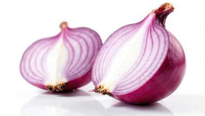 Red onion cut in half, revealing rings, white backdrop, fresh, texture