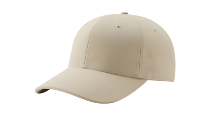 A close up of a beige baseball cap with a curved brim against a black background in soft lighting