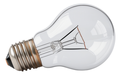 A clear incandescent light bulb lies on its side showing its filament and metallic base.