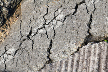 cracked asphalt after earthquake