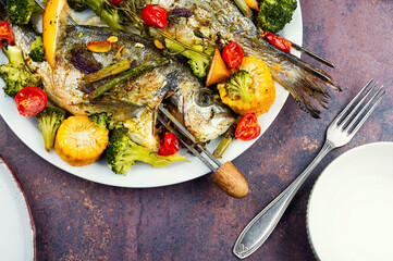 Delicious roasted fish sea bream, BBQ.