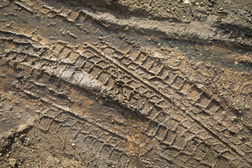  Dirty and muddy ground road in the nature at spring time.