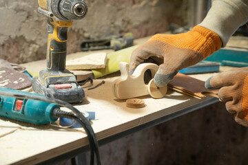 Caucasian craftsman working in a workshop.