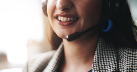 Customer support, woman and closeup with headset in office for hotline, advice or crm service. Consultant, smile and microphone technology with conversation for consulting, help and communication