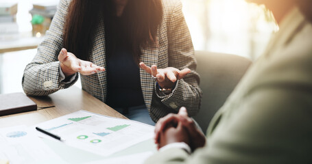 Hands, business people and discussion with feedback, graphs and profit growth or sales analytics....