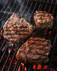 Sizzling and Deliciously Grilled Steaks on the Barbecue Grill for