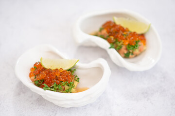 Mini appetizers with red caviar, appetizer idea for a festive table