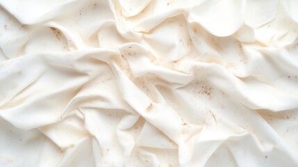 Whipped cream texture with light brown speckles
