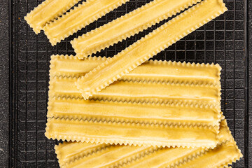 Pasta parpadelle stuffing mushrooms dish vegetable fresh gourmet food background on table rustic...
