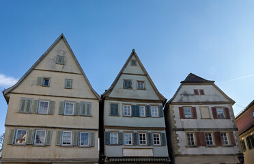 old, partly in need of renovation, houses with an old architectural style, in the city center