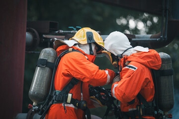 Firefighters are working together to extinguish the fire. The rescue efforts also include providing...