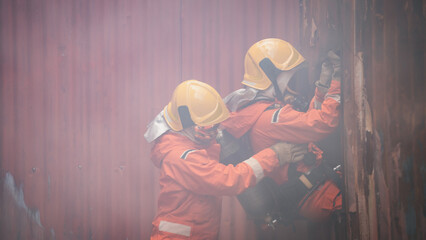 Firefighters are working together to extinguish the fire. The rescue efforts also include providing...
