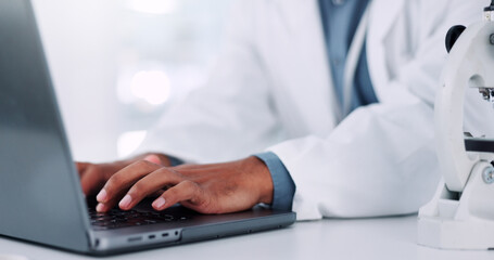 Fototapeta premium Hands, scientist and typing on laptop in lab of medical research, communication or experiment results. Person, tech or study information of investigation feedback, discovery update and vaccine report