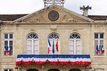 Obraz premium Town Hall of Auch displaying French and European Union flags in Place de la Liberation, Occitanie, France
