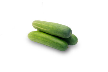 Fresh Green Cucumbers stacked Isolated on White Background