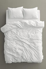 Minimalist Overhead Shot of a Comfortable White Bedding Set on a Grey Background Showcasing Clean Lines and a Relaxing Ambiance for Interior Design and Home Decor