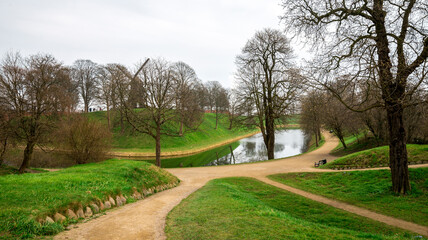 Scenic Park View with Pathways and a Reflective Moat at Kastellet Fortress Complex, Copenhagen, Denmark, 16 April 2018